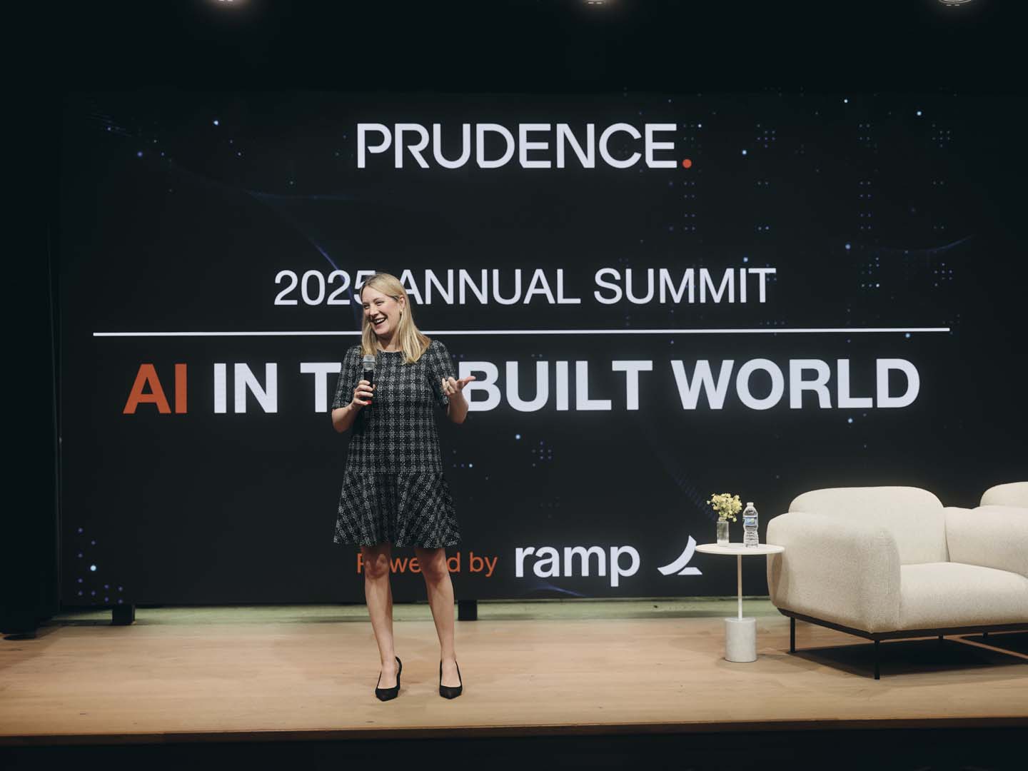 Melissa Landry-Koller presenting on stage at the Prudence Annual Summit