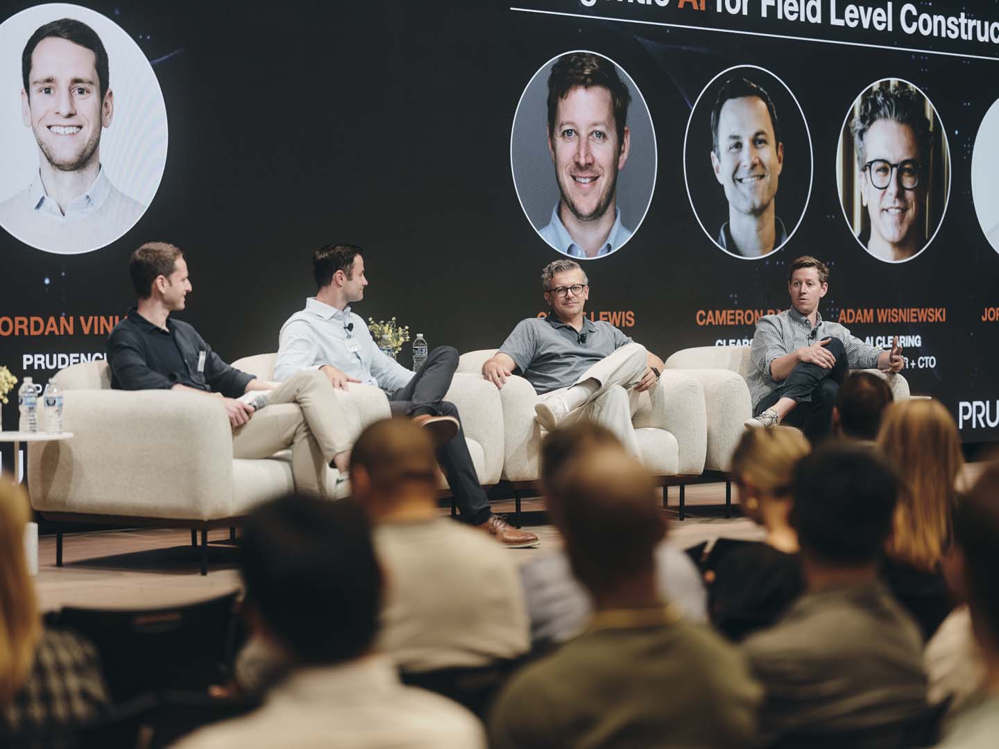 Jordan Viniar on a panel before a full room